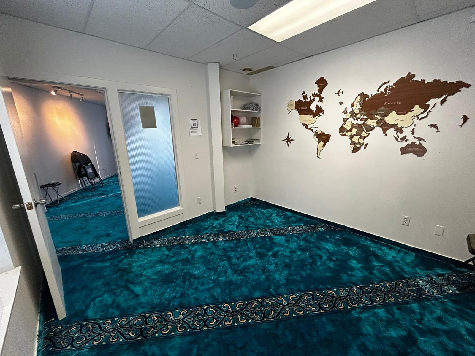 Hallway with a doorway and calligraphy decor