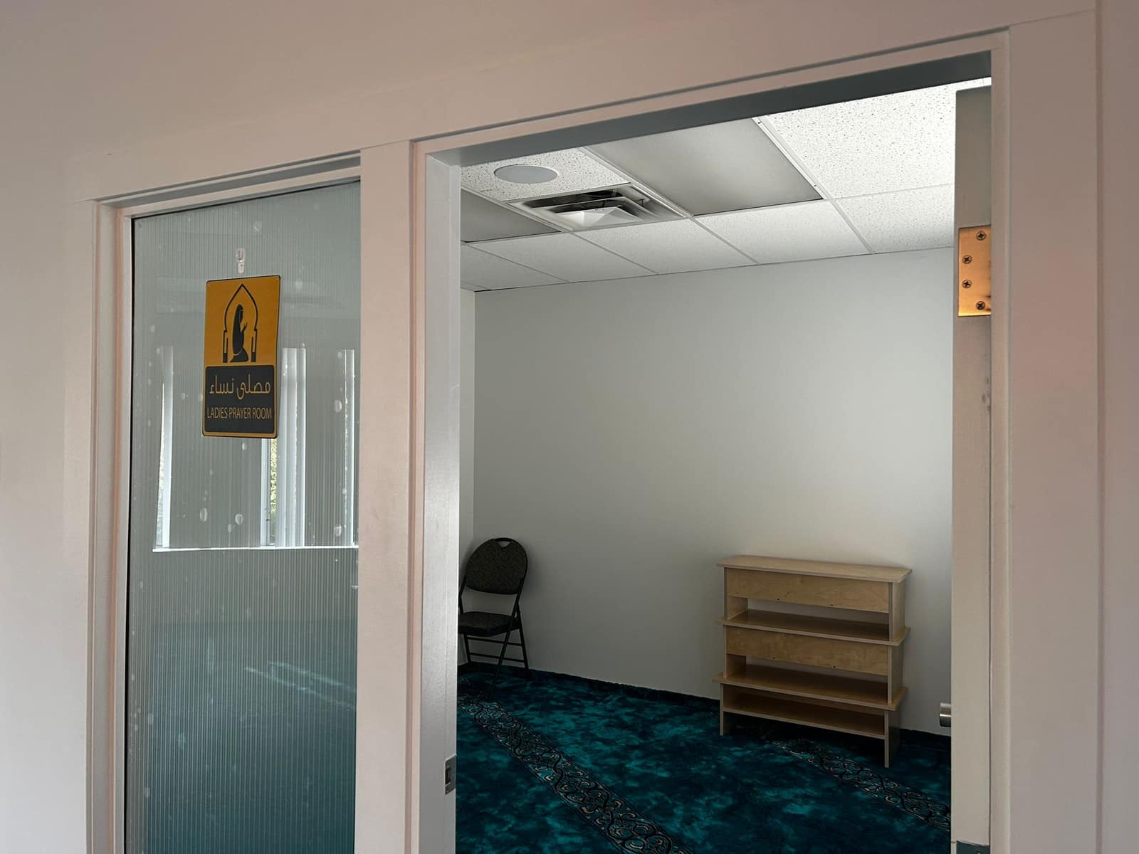 Shoe rack and storage area near the entrance