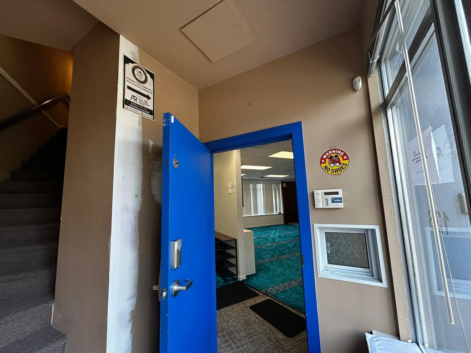 The center's blue entrance door at the Brentwood location